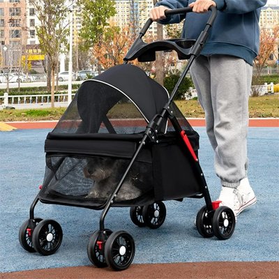 Poussette double pour chien MobilConfort noire avec un petit Schnauzer dans le compartiment inférieur, idéale pour transporter deux animaux ou offrir plus d'espace de rangement.