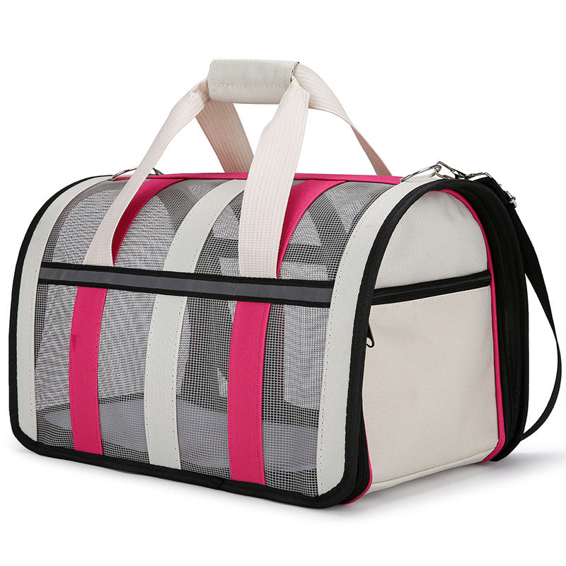 Sac de transport pour chien Le Rétro de couleur rose rouge et crème avec parois en maille grise, poignées de transport confortables et design moderne style sac de sport.