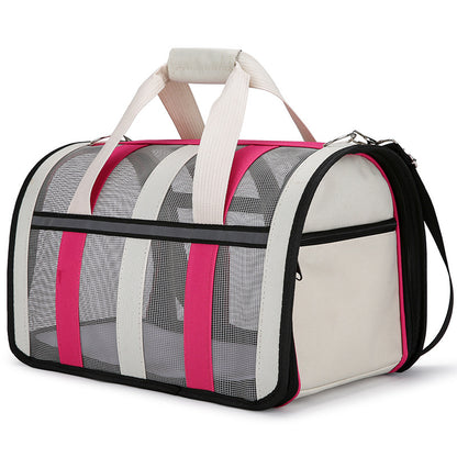 Sac de transport pour chien Le Rétro de couleur rose rouge et crème avec parois en maille grise, poignées de transport confortables et design moderne style sac de sport.