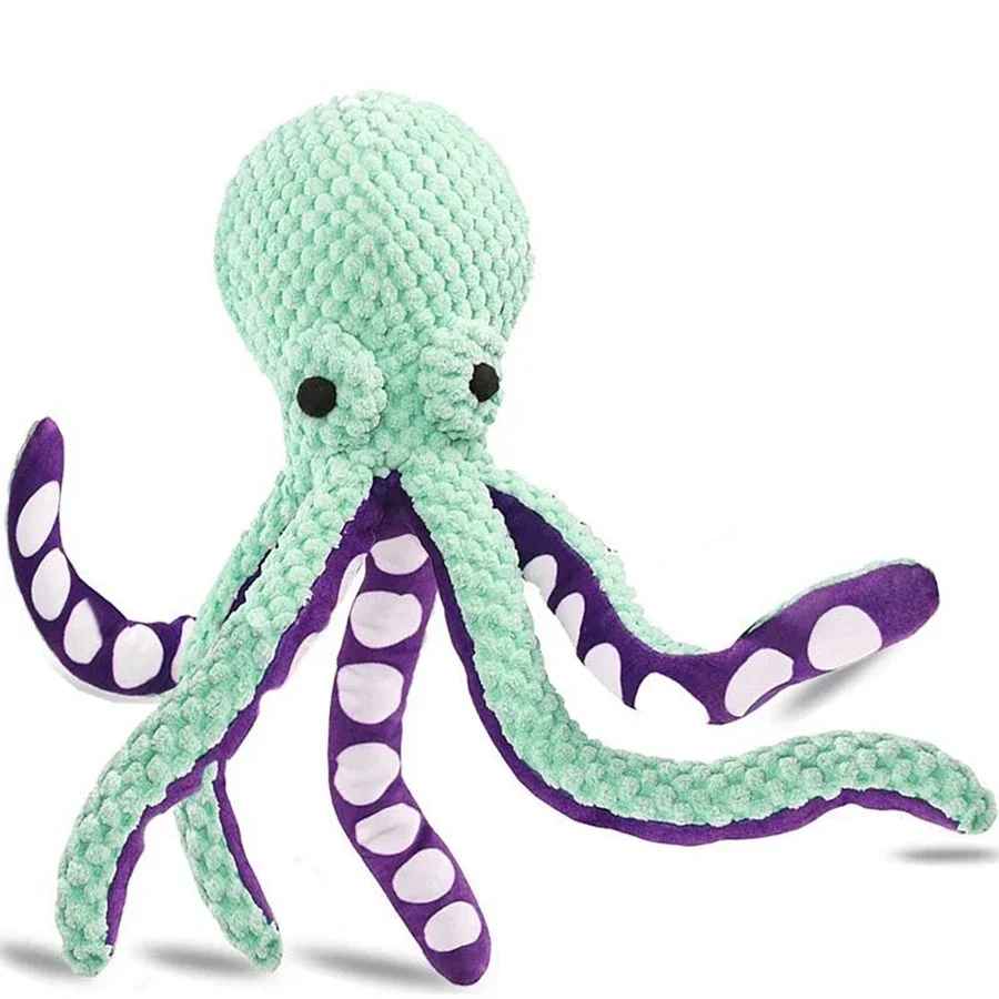 Peluche jouet pour chien en forme de poulpe de couleur turquoise et violette avec huit tentacules souples.