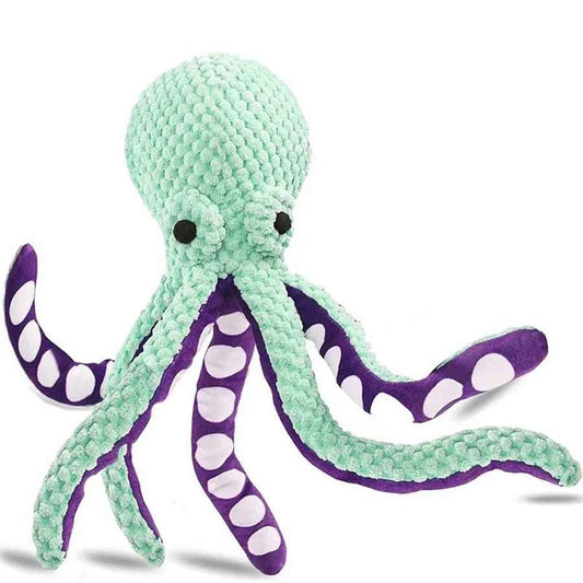 Peluche jouet pour chien en forme de poulpe de couleur turquoise et violette avec huit tentacules souples.