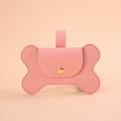 Distributeur de sacs à crottes design en simili-cuir pour laisse, pochette élégante en forme d'os avec fermeture à pression, accessoire d'hygiène canine, boutique Pitou et moi.