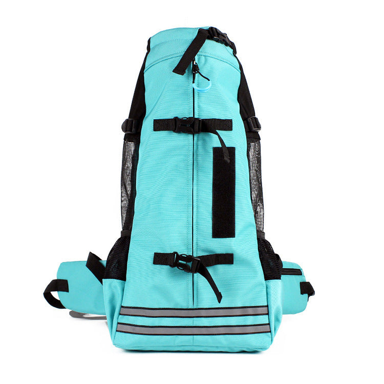 Vue de profil du sac à dos de transport pour chien L'inséparable en bleu turquoise, montrant le tissu Oxford, le filet d'aération noir et les bandes réfléchissantes de sécurité.