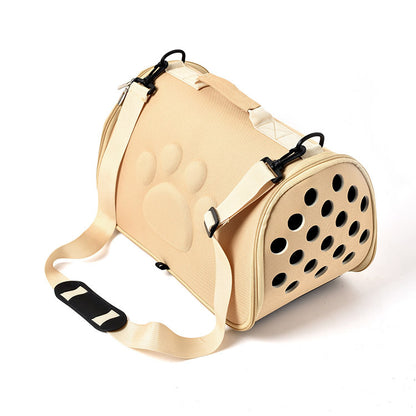 Sac de transport pour petit chien Toutou Express couleur beige avec bandoulière et aérations latérales.