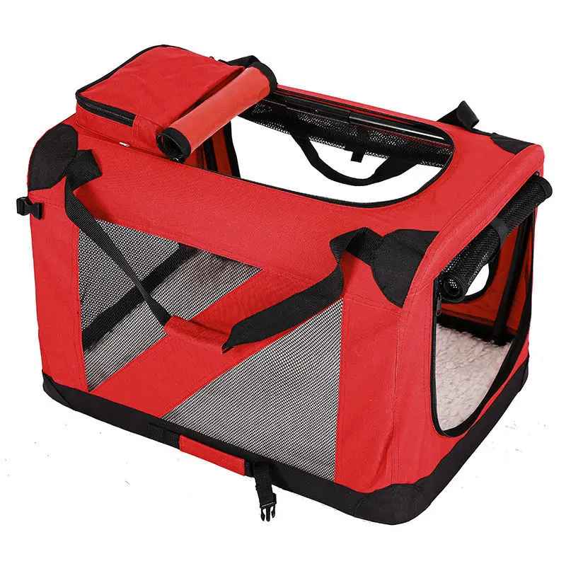 Vue d'ensemble de la cage de transport Nid Mobile rouge montrant les panneaux en maille respirante, la poignée de transport rembourrée et l'ouverture latérale zippée pour un accès facile.