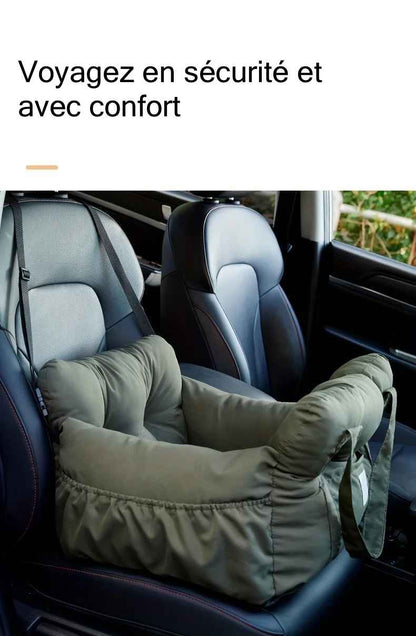 Siège auto pour chien Cocon Voyageur vert kaki avec parois rembourrées confortables, installé sur un siège de voiture pour un voyage sécurisé.