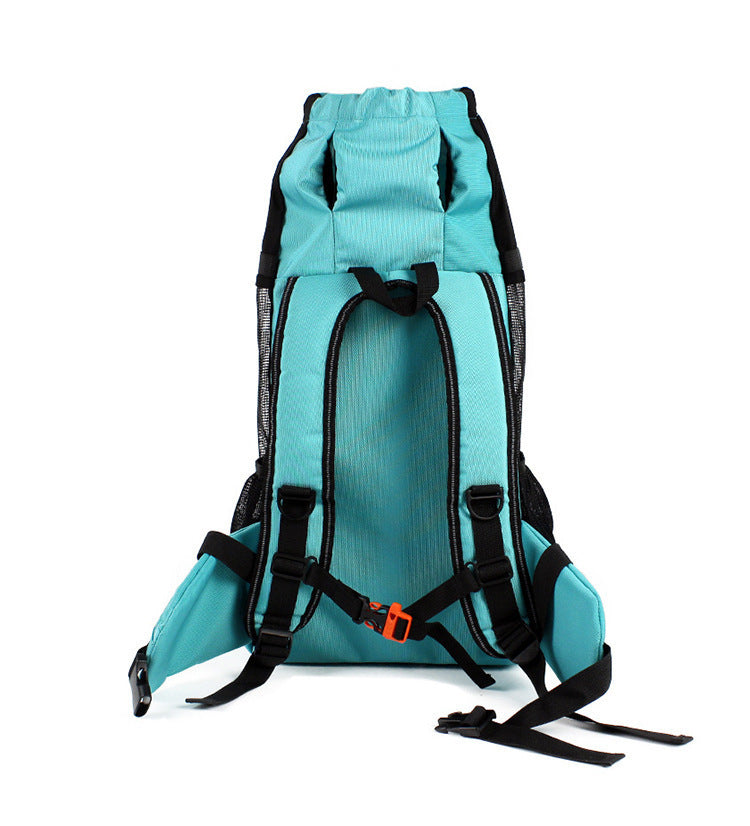 Vue arrière du sac à dos de transport pour chien L'inséparable bleu turquoise, montrant les bretelles ergonomiques rembourrées, la sangle de poitrine avec boucle orange et le dossier respirant.